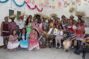 The dancers of the Quadrilha pose for a photo