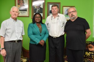 Minister within the Ministry of Natural Resources, Simona Broomes (second from left) with officials of the company (GINA photo)