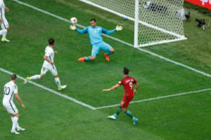 Portugal’s Andre Silva scores their third goal. (REUTERS/Carl Recine)