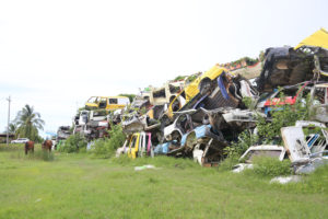 This formidable scrapyard, more than three metres (ten feet) high in some places, reposes along both banks of a canal in Annandale, East Coast Demerara. (Photo by Keno George)