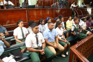Students from various secondary schools in Georgetown attached to the Parliament of Guyana for work- study paying keen attention to last Thursday’s sitting of Parliament.  