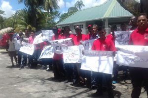 Workers from the East Demerara Water Conservancy protesting outside the Ministry of Agriculture yesterday.