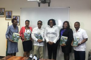 Minister within the Ministry of Public Infrastructure Annette Ferguson (fourth from left), Chairman of the Transport Advisory Council, Basil Blackman (third from left), Deputy Chairman Marcelene Merchant (second from left), and other members of the council yesterday  