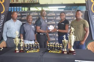 Guinness Brand Manager Lee Baptiste (centre) and Colours Boutique representative Creanna Damon at the launch of the 2017 Guinness National Championship. Outdoor Events Manager Mortimer Stewart (left), Communications Officer Troy Peters (2nd from left) and Referees Coordinator Wayne Griffith look on
