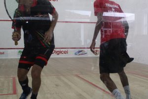 Guyana’s Captain Benjamin Mekdeci (left) was in fine form whilst easing pass Trinidad’s Nicolas Caddle, 11-4, 11-3, 11-6 yesterday morning at the Georgetown Club (Royston Alkins Photo)
