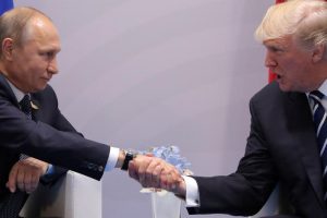 US President Donald Trump shakes hands with Russian President Vladimir Putin during their bilateral meeting at the G20 summit in Hamburg, Germany July 7, 2017. (Reuters/Carlos Barria)