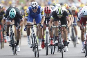 Quick-Step Floors rider Marcel Kittel, second left, of Germany, cycles to win on the finish line.  (REUTERS/Christian Hartmann)