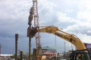 Pile driving for pedestrian overpass:  Pile driving has commenced at Providence for one of the three pedestrian overpasses to be constructed along the East Bank Demerara. (Photo by Keno George)

