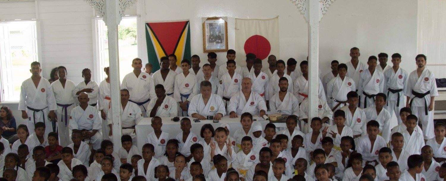 The successful karatekas of the recent Shotokan Karate grading exercises. Shuseki Shihan Frank Woon-A-Tai is seated in the centre

