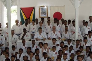 The successful karatekas of the recent Shotokan Karate grading exercises. Shuseki Shihan Frank Woon-A-Tai is seated in the centre