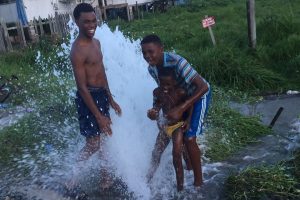 Blankenburg water main: This water main at Blankenburg, West Coast Demerara broke around 3.30 pm yesterday and these youngsters were enjoying themselves. Up to 6.20 pm it still had not been fixed.
