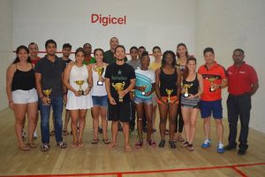 Some of the participants of the  Guyana Squash Association 2017 Digicel senior national squash championships with the spoils following the presentation ceremony.