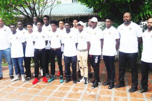 Members of the Guyana u17 Basketball Team posing for a photo opportunity prior to their departure for the Dominican Republic to compete at Centrobasket U17 Championship. Also in the photo is GABF President Nigel Hinds (left).