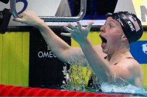 Lilly King of the U.S. reacts after breaking the world record.
