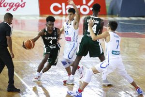Guyana’s Kevon Wiggins on the attack against Puerto Rico during their clash at the CentroBasket U17 Tournament in the Dominican Republic