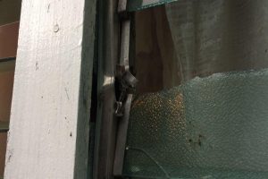 A window belonging to East Ruimveldt Resident, Joy Thomas-Allicock that was broken during the shootout between members of the Joint Services and prison escapee, Clive Forde.
