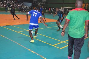 Gregory Richardson of Sparta Boss attempting a pass against Future Stars during their semi-final match in the GT Beer/Keep Ya Five Alive Football Championship at the National Gymnasium.
