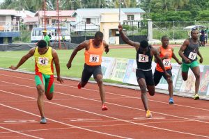 GOLDEN BOY. Compton Caesar adds another gold medal to his list of achievements this year when he won the Athletics Association of Guyana senior 100m event yesterday at the Leonora Track and Field centre. (Orlando Charles photo)