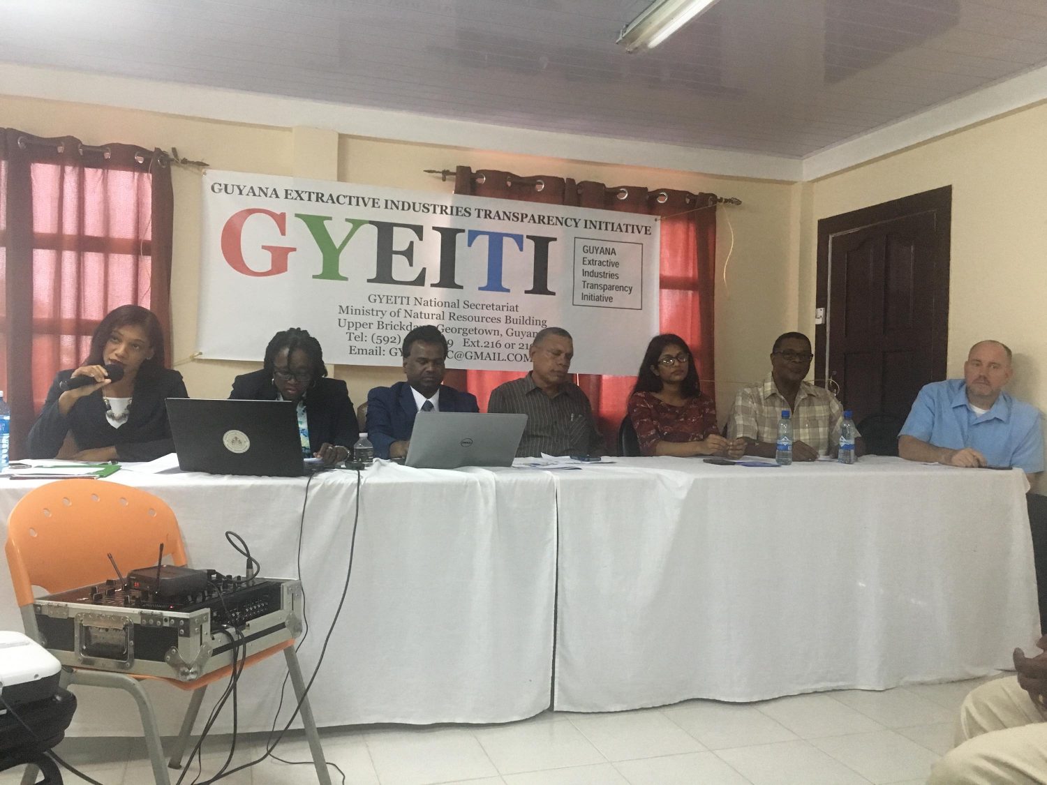 National Coordinator of the Guyana Extractive Industries Transparency Initiative (GYEITI) Rudy Jadoopat (third from left) along with Regional Chairman Gordon Bradford (fourth from left), Representation on the Multi-Stakeholder Group from the government, Gillian Pollard (second from left) and Country Representative of the Carter Center, Jason Calder (right) at the outreach on Wednesday in Bartica. 