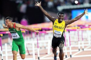 Jamaican Omar McLeod celebrates after winning the men’s sprint hurdles at the IAAF World Championships yesterday.