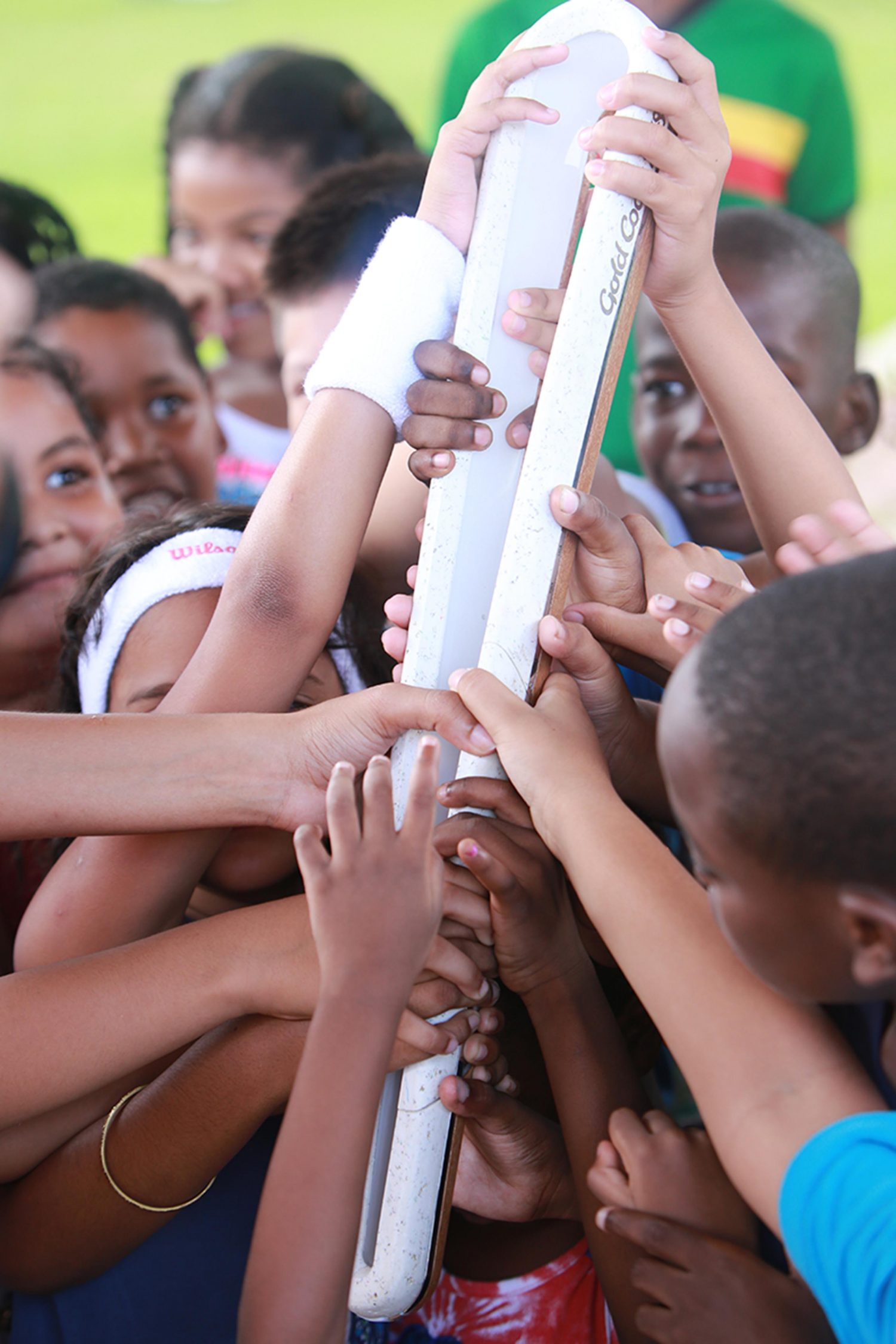 Children holding the baton as it made its way through the Botantical Gardens.