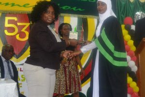 Permanent Secretary in the Ministry of Agriculture, Joylyn Nestor-Burrowes (left) presenting the award for the best graduating student to Narifa Mokhan from the 2017 class of the Guyana School of Agriculture. The graduation was held yesterday. (Ministry of Agriculture photo)