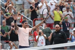 Roger Federer reacts after recording match point against David Ferrer during the Rogers Cup tennis tournament at Uniprix Stadium. (Jean-Yves Ahern-USA TODAY Sports)