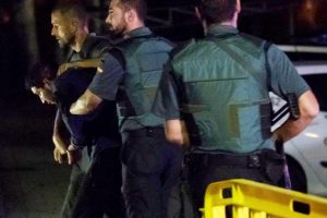 Spanish Civil Guards escort one of four men accused of involvement in an Islamist cell behind a van attack in Barcelona last week, in Tres Cantos, Spain, August 21, 2017. (Reuters photo)