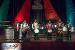 Tassa CARIFESTA
Guyana’s Tassa drumming team and African drumming team shared the stage in an exhilarating performance on Tuesday night at the Christ Church Foundation School in Barbados as part of CARIFESTA (DPI photo)
