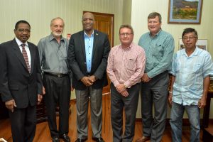 From left are Robert Corbin, Legal Counsel, First Bauxite Corporation (FBX);  Larry Washow, Chairman of the Board of Directors, FBX Corporation; Minister of State,  Joseph Harmon;  Alan Roughead, President and Chief Executive Officer, FBX Corporation;  Bill White, Chief Financial Officer and  Stanley Ming, Chairman of the Board of Directors of the Guyana Geology and Mines Commission. (Ministry of the Presidency photo)  
