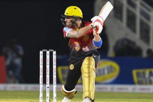 Trinbago Knight Riders’ Brendon Mc Cullum hits a six during his knock of 91 Saturday night against the Jamaica Tallawahs. (CPL T20 via Getty Images)