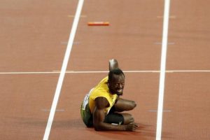  Men’s 100 Metres Relay Final, Usain Bolt grimaces in agony after injury(John Sibley)
