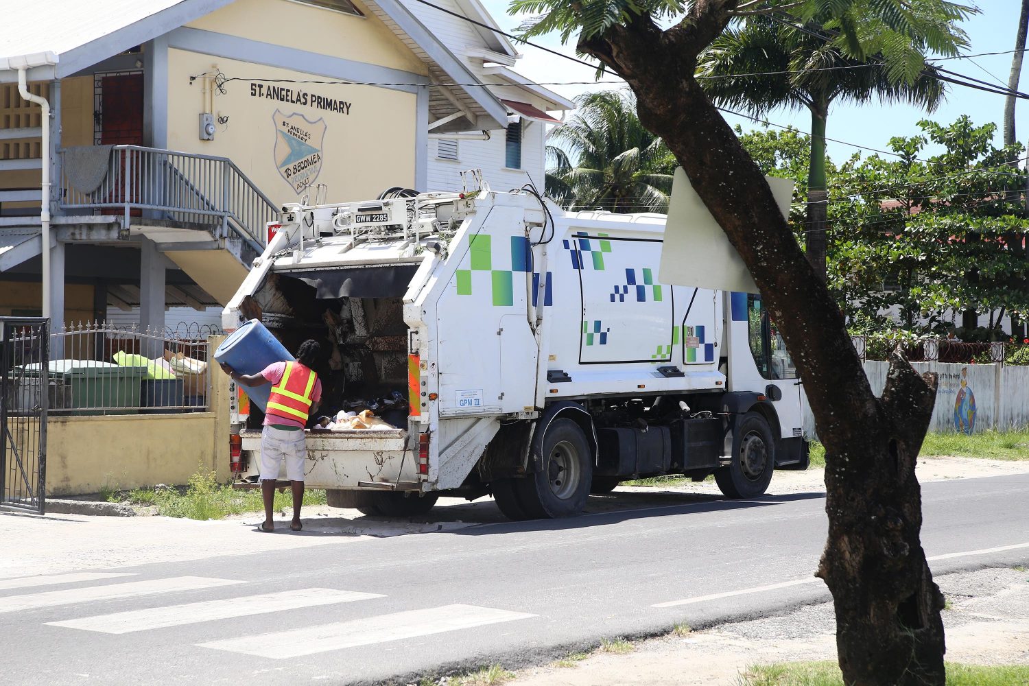Garbage being picked up in Thomas Street, Georgetown on Thursday. 