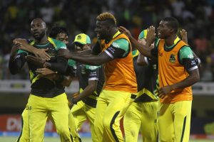 Jamaican celebration! Player of the Match, Kesrick Williams (left) is mobbed by his Tallawah teammates at the end of last night’s game at the National Stadium at Providence (Orlando Charles photo)