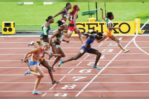 American Tori Bowie wins the women’s 100m final in a close finish with Ivory Coast’s Marie Josee Ta Lou yesterday. (Reuters photo)