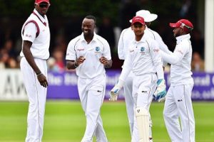 Seamer Kemar Roach (second from left) celebrates another wicket with teammates during the final day of the three-day game against Essex. (Photo courtesy CWI Media)