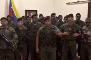 A still image from video released by Operation David Carabobo purportedly shows a group of men dressed in military uniforms announcing uprising in Valencia, Venezuela August 6, 2017. Operation David Carabobo/Handout via REUTERS
