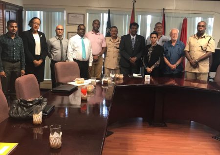 Public Security Minister Khemraj Ramjattan (fifth from right), acting Police Commissioner David Ramnarine (sixth from right) and acting Prisons Director Gladwin Samuels (at extreme right) with members of the Private Sector Commission (Private Sector Commission photo)