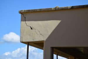 Long cracks along the support structure of the school (DPI photo)