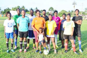 N-Zinga Maxwell (fifth, left) with young Fruta Conquerors footballers 