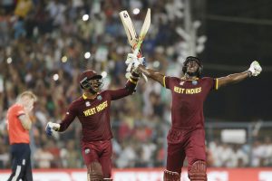 Flashback! Marlon Samuels and Carlos Brathwaite,right, celebrate the West Indies’ T20 2016 World Cup win ove England after Brathwaite had struck England’s Ben Stokes left, for four consecutive sixes.
