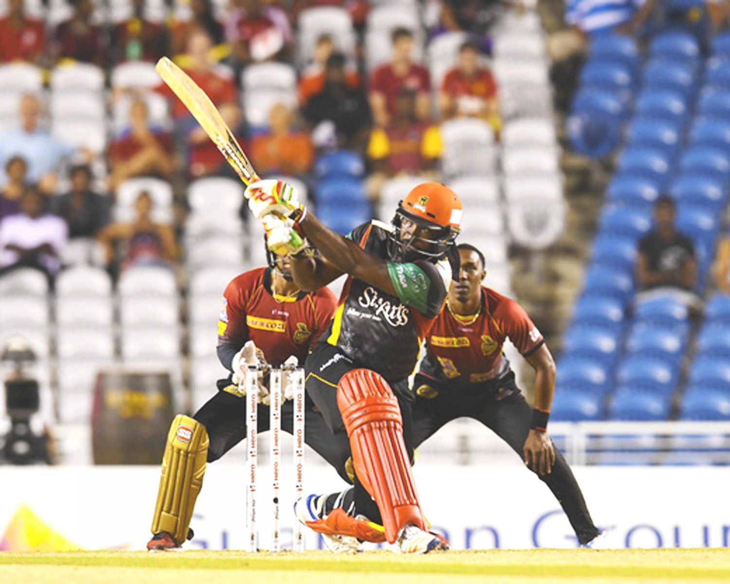 Chris Gayle held the St Kitts and Nevis Patriots innings together with an unbeaten knock of 54. A bove he hits a 6 during the Play Off Match of the 2017 Hero Caribbean Premier League between St Kitts & Nevis Patriots and Trinbago Knight Riders at Brian Lara Cricket Academy in Tarouba, Trinidad last night. (Photo by Randy Brooks - CPL T20 via Getty Images)