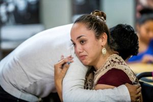 Paulina, 26, a DACA recipient is comforted (Reuters photo)