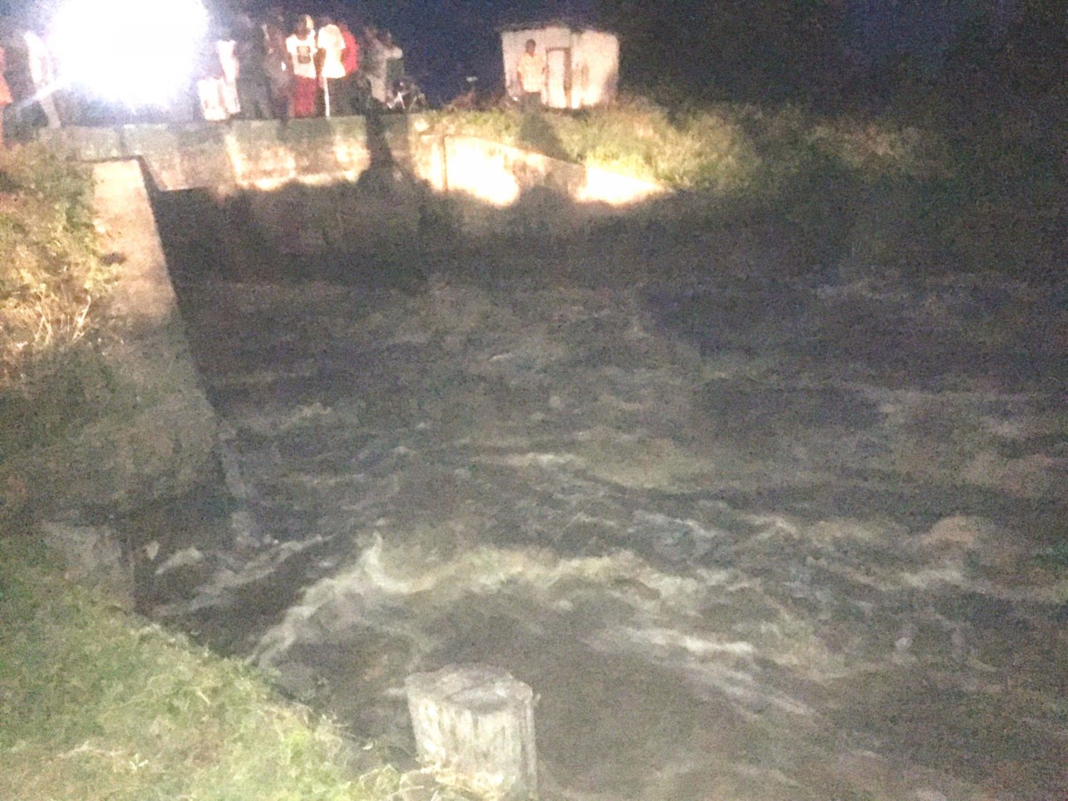 Water gushing inland from the Atlantic Ocean last evening after the sluice door at the De William, West Coast Demerara, Koker  ws destroyed by the Atlantic current (Dhanash Ramroop photo)