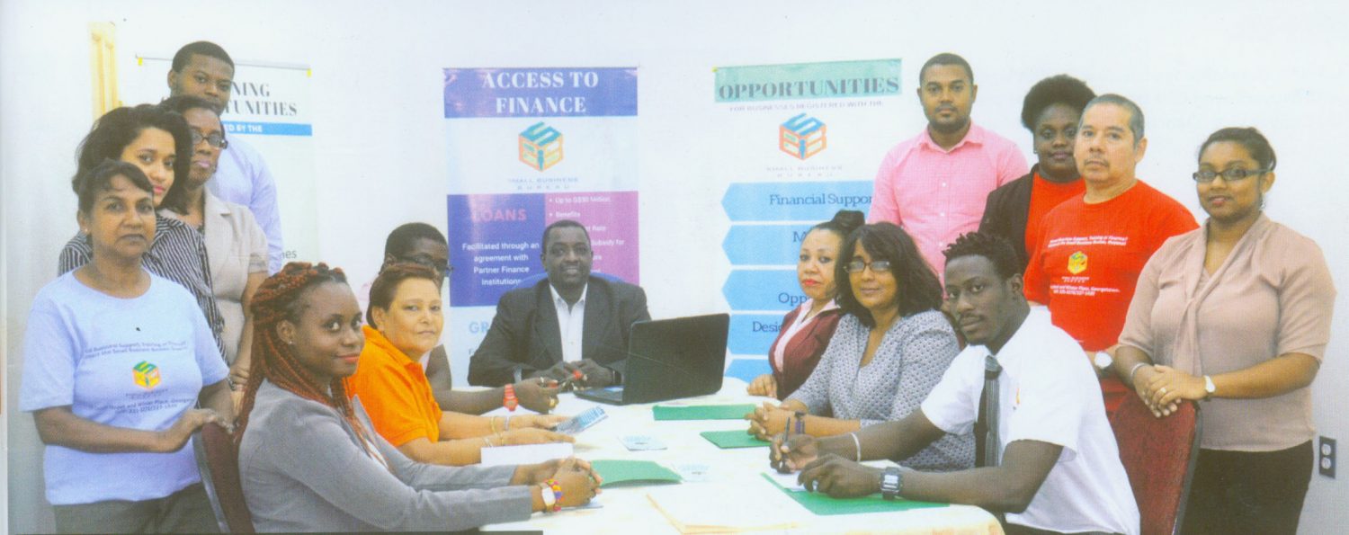  Members of staff of the Small Business Bureau. Seated at centre is the Bureau’s recently appointed Chief Executive Officer Dr. Lowell Porter