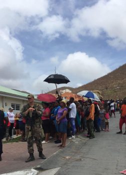 Persons waiting in line for water in St Maarten