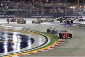 Ferrari’s Sebastian Vettel leads Mercedes’ Lewis Hamilton in Sunday’s Singapore Grand Prix just before the crash. (Reuters photo)
