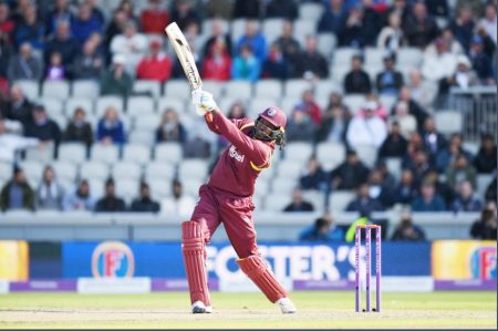 Opener Chris Gayle goes on the attack during his urgent 27-ball 35 in the opening ODI against England yesterday. (Photo courtesy CWI Media) 