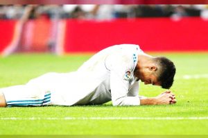 A dejected Cristiano Ronaldo after his team’s shocking defeat yesterday. (Reuters photo)
