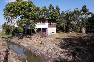 A suspect’s house in Sisters Village, East Bank Berbice, behind which missing teen Leonard Archibald’s bicycle was found